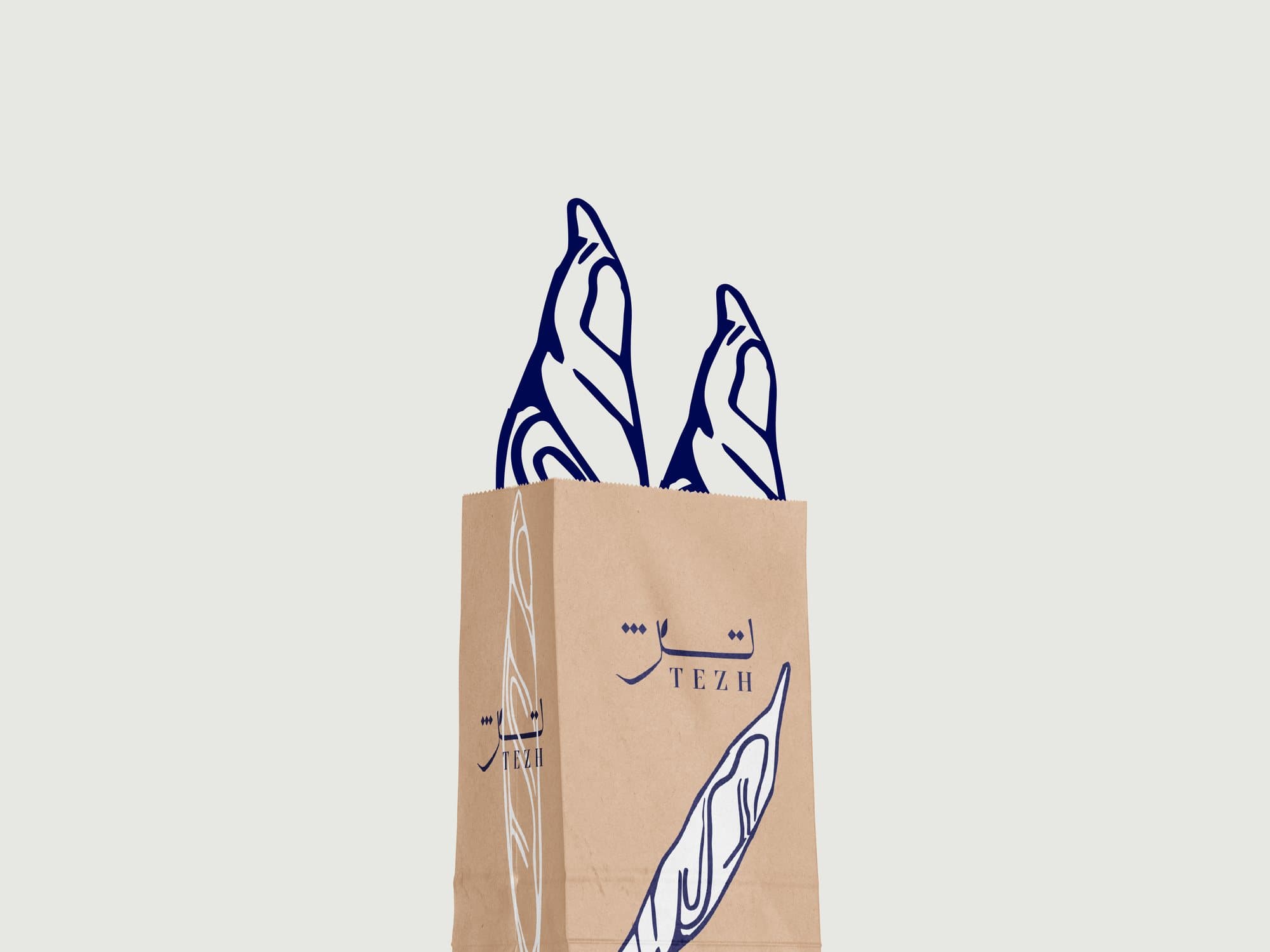 The Tezh paper bag with the leaf motif rising from it