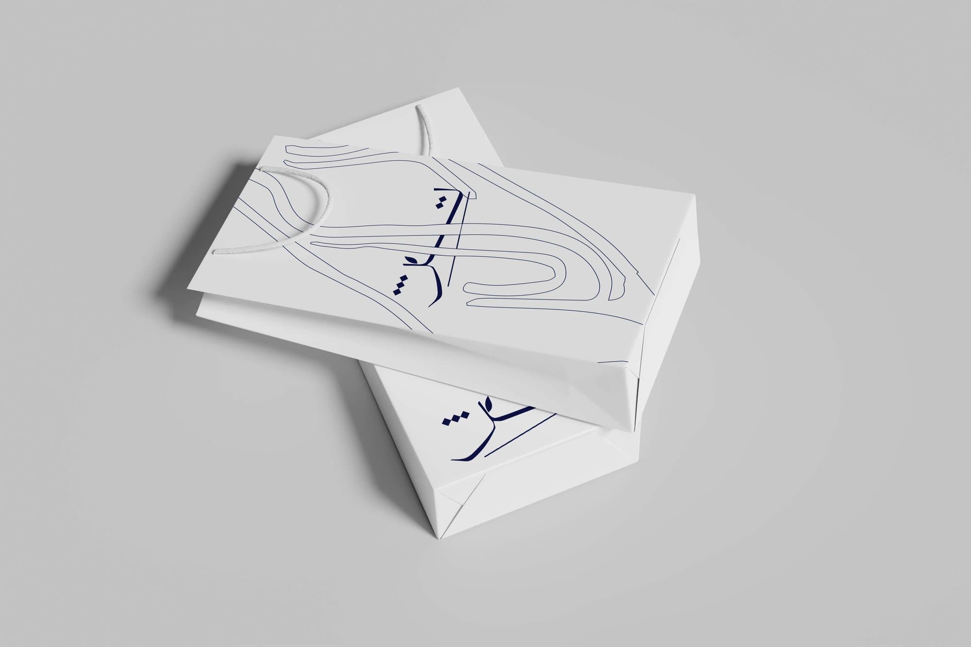 Folded stationery showing the leaf motif